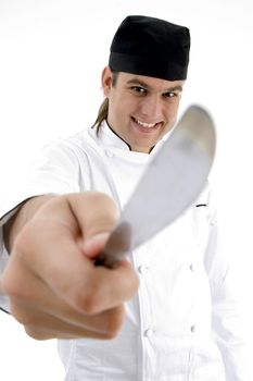 male chef showing kitchen tool with facial expressions on an isolated white background