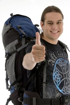 young traveler with backpack against white background