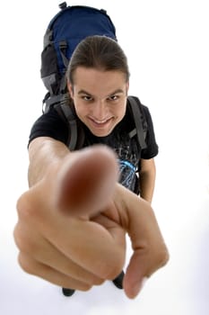 close up view of young traveler's finger on an isolated white background