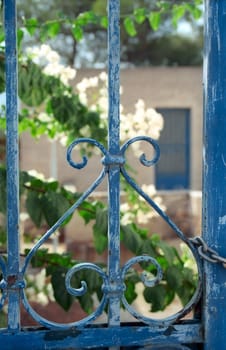 Fragment of decorative blue house grating