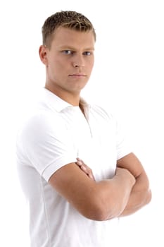 portrait of young man in cool pose on an isolated white background