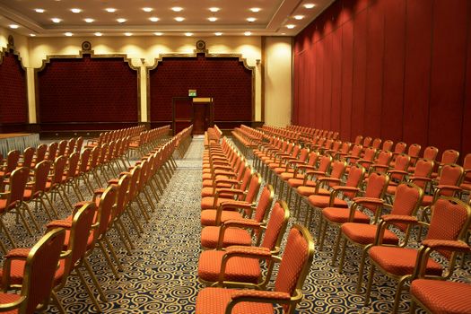 lines of chair in conference room