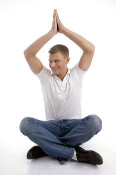healthy guy in yoga position with white background