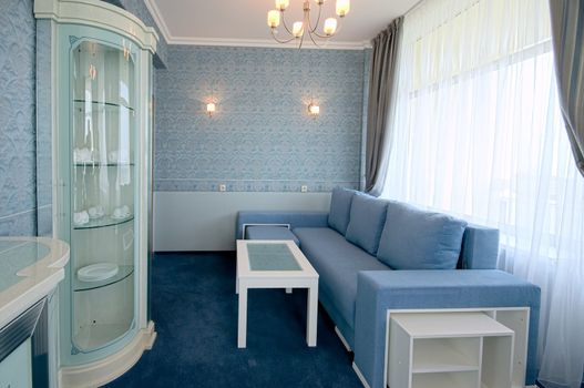 room interior with blue and white furniture