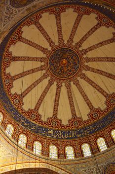 cupola of blue mosque decorated with arabesque