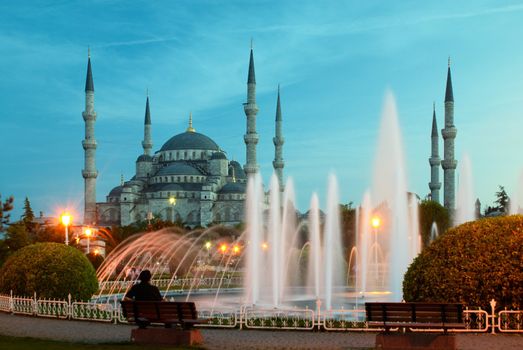 man sitting near of blue mosque in Istanbul