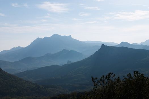 Mountainous country in the light haze 