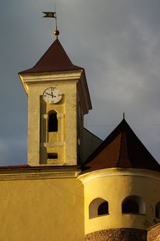 horologium with clock in castle Palanok in Ukraine