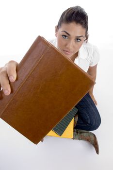 close up view of teenager student's book on an isolated white background