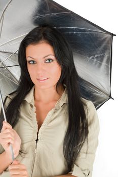 Brunette girl posing with umbrella