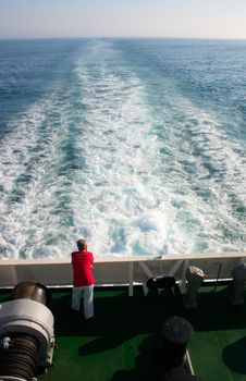 solitude man on board a liner in open sea