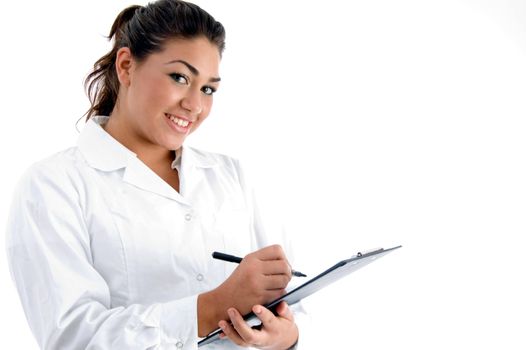 smiling doctor with writing board with white background