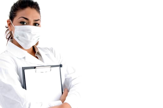 doctor with mask on her mouth and writing board on an isolated background