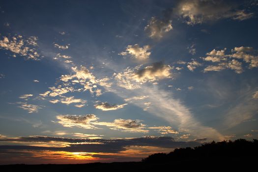 Sky with color clouds, illuminated by sunrise