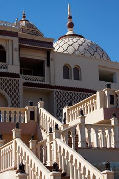 Detail of oriental building with columns and domes