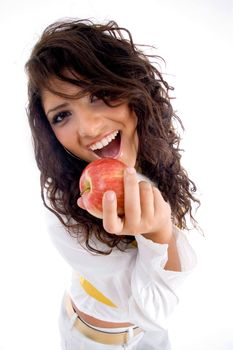 woman going to eat apple on an isolated background