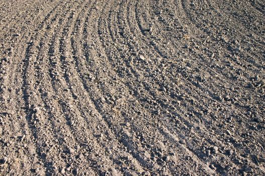 texture of ploughed earth on the spring field