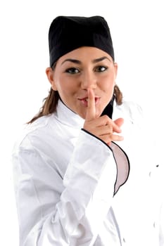 chef instructing to keep silent on an isolated white background