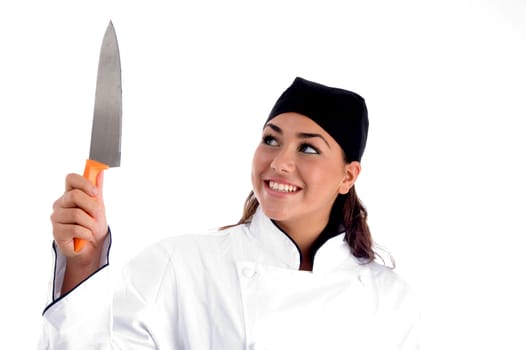 smiling chef with knife on an isolated background