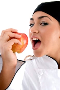 chef going to eat apple on an isolated background