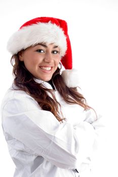 smiling young woman wearing christmas hat on an isolated white background