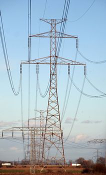 Electric pylons in field