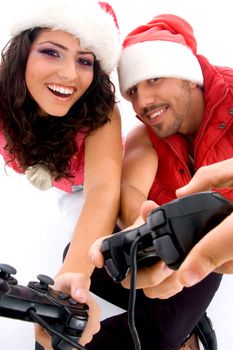 brother and sister playing video game on an isolated white background