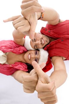 laying lovers showing hand gesture with white background