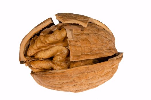 Cracked walnut with a kernel inside 