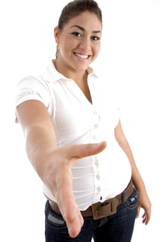 smiling model offering hand shake against white background