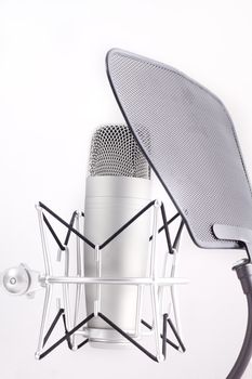 Professional studio microphone on white background