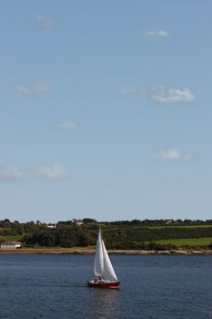 a yacht sailing in youghal bay ireland