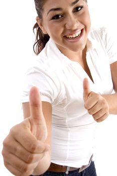 smiling woman showing good luck sign with white background