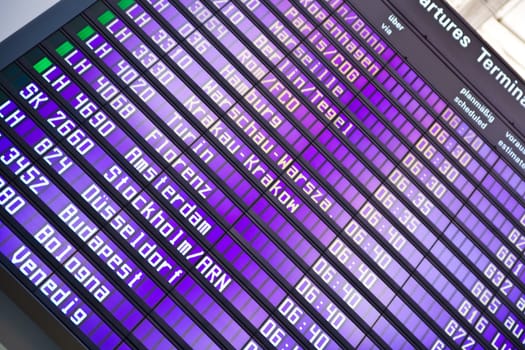 Timetable on german airport showing departure times.