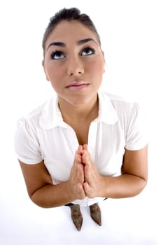 praying young woman on an isolated background