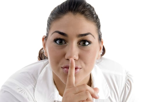 woman instructing to be silent on an isolated background