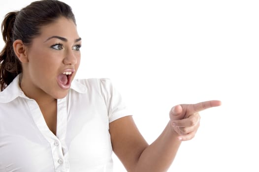 shouting woman indicating side on an isolated background