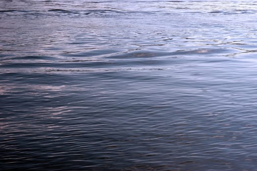 the ripples and wave patterns in the water