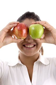 woman posing with apples on an isolated background