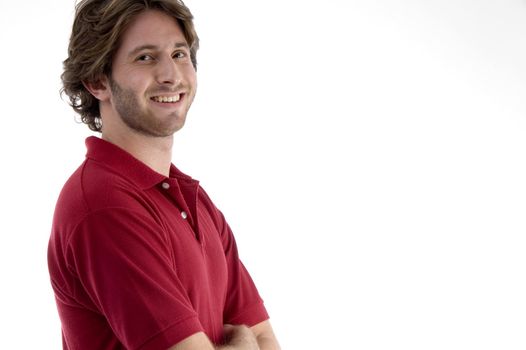 side pose of pleased male against white background