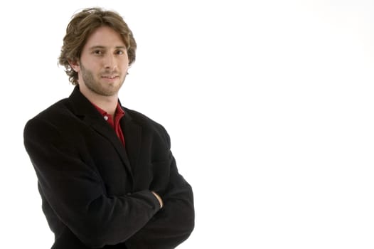 young man with folded hands on an isolated white background