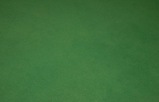 Green background from casino cloth from table