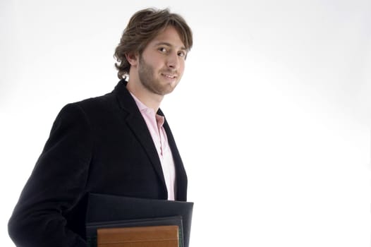 handsome man holding files on an isolated white background