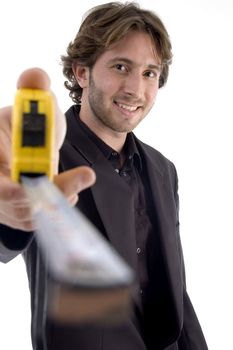 male showing measuring tape on an isolated white background