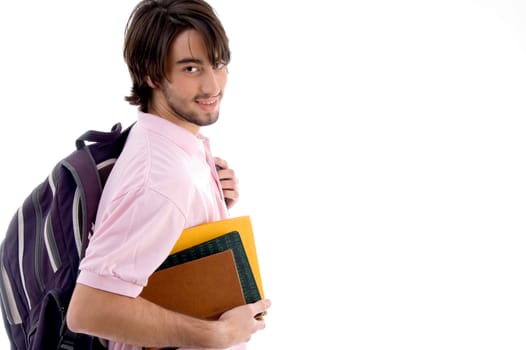 student with books and bag on an isolated white background