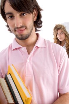 young students holding books on an isolated white background