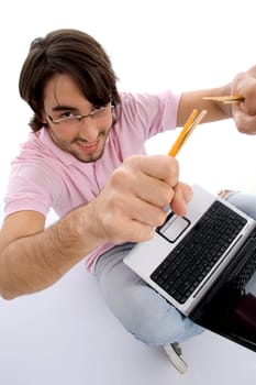 happy man with notebook and pencils against white background