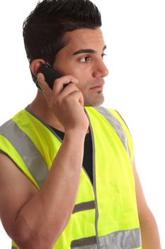 Tradesman, handyman, builder on cell phone and looking sideways, suitable for a message.  White background.