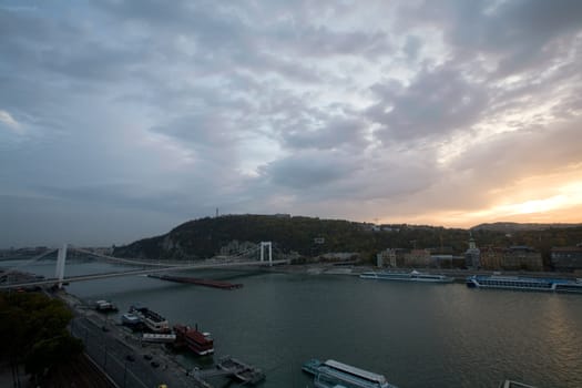 Dusk on the river Danube in Budapest with blue sky