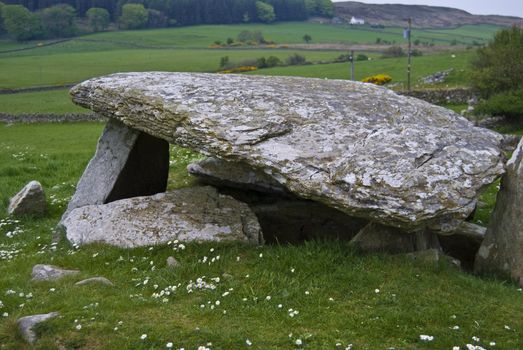 ancient passage tomb in the beautiful scenery of Scotland